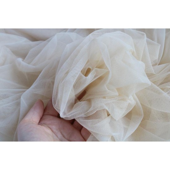 Elevate Your Occasion with Champagne Tulle Fabric